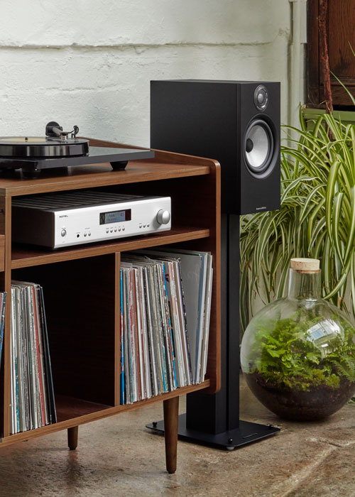 A hi-fi audio setup with a record player and vinyl collection.
