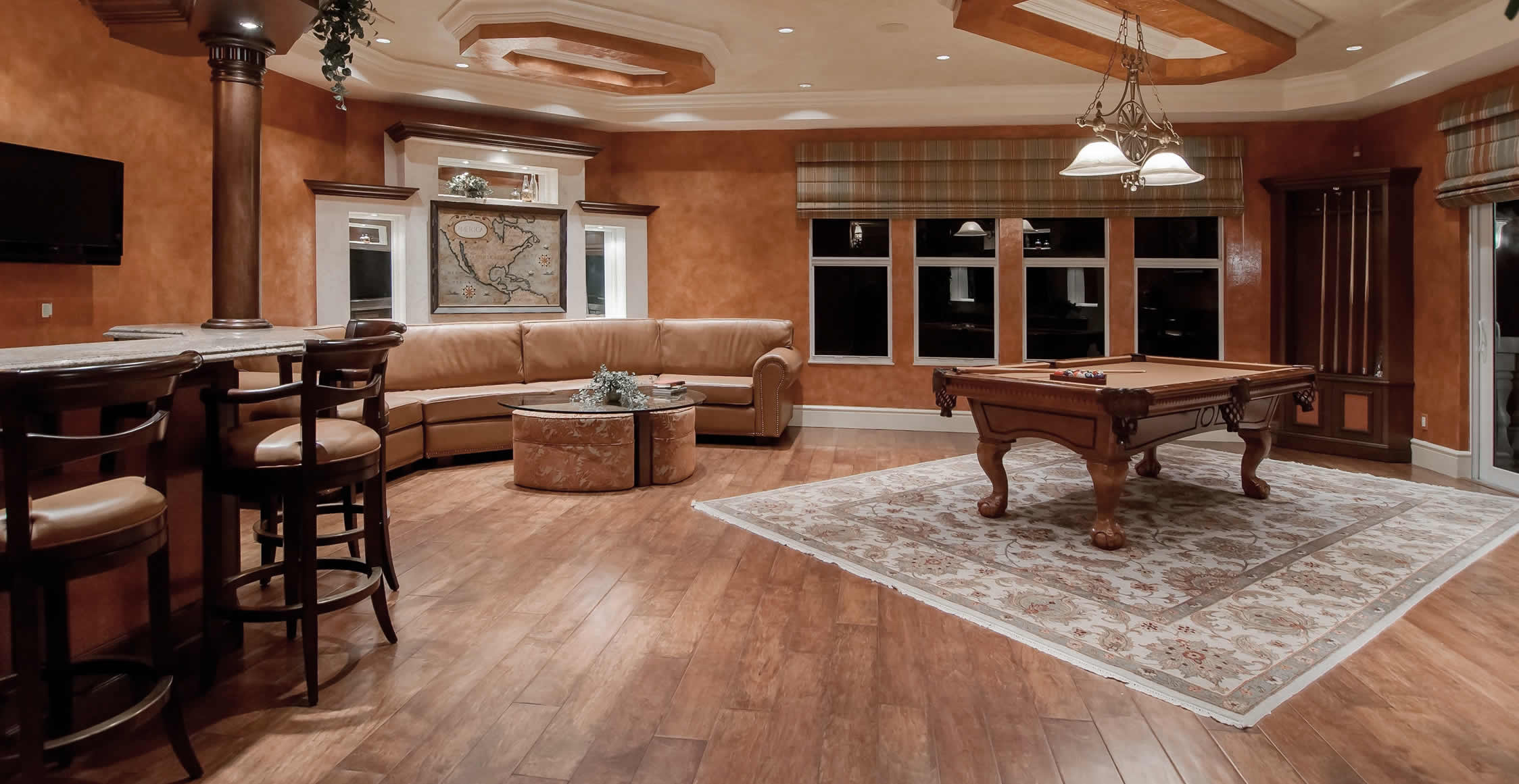 orange toned bar and game room